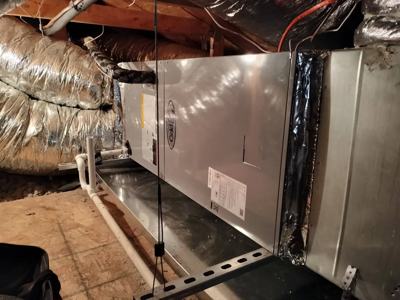 Trane air handler installed in a Phoenix attic with new plenum and insulated duct